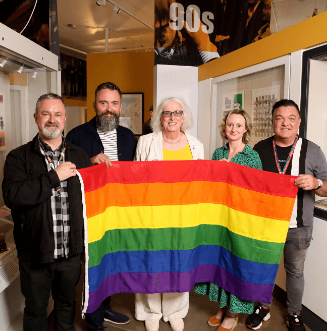 Rainbow Flag being donated to Ulster Musem