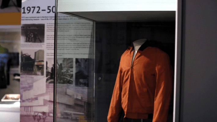 orange jacket in display case